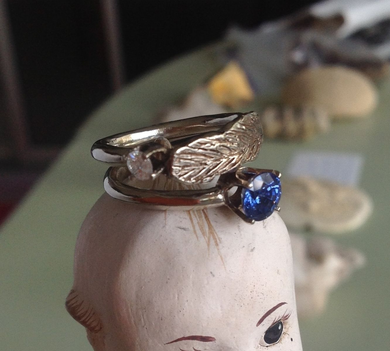 Buy a Custom Feather Engagement Ring In 14k White Gold And Sapphire