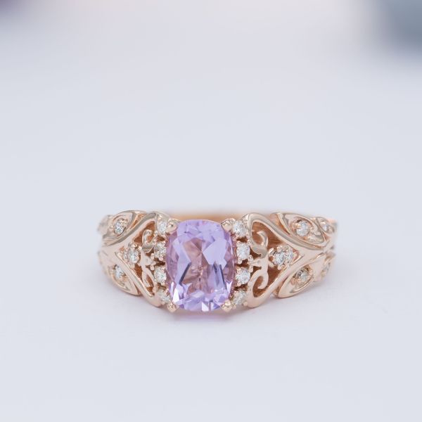 A cushion-cut Rose de France amethyst brings its blushing lilac color to this vintage-inspired rose gold ring.