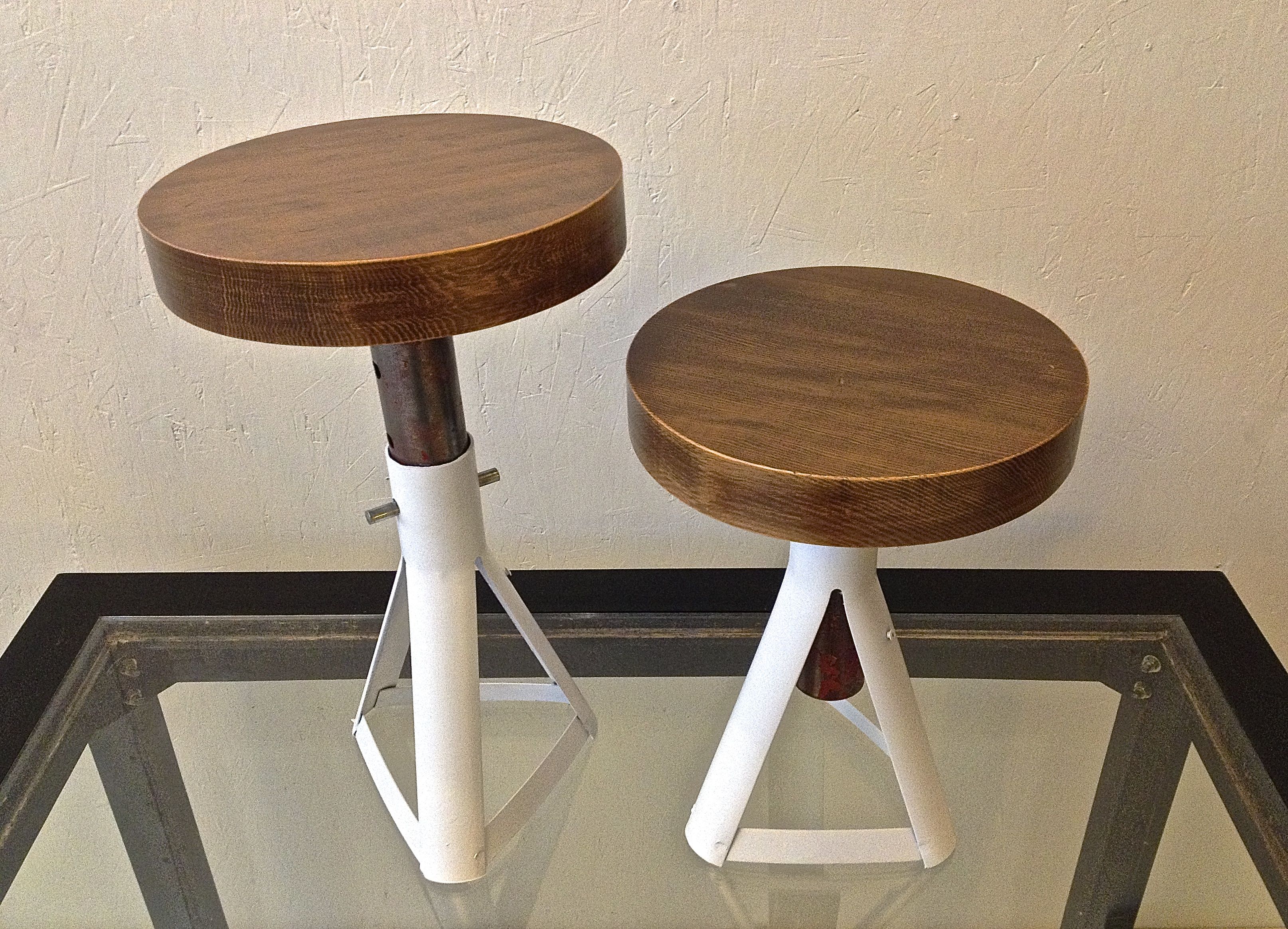 Repurposed car jack stands as stools with various wood tops