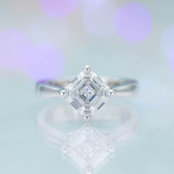 An asscher cut moissanite will look quite sparkly, even though the cut is not designed to maximize brilliance.