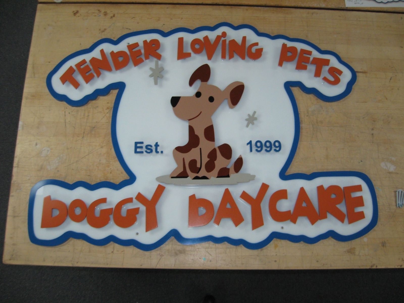 hand-made-doggy-daycare-business-sign-by-impressive-prototypes