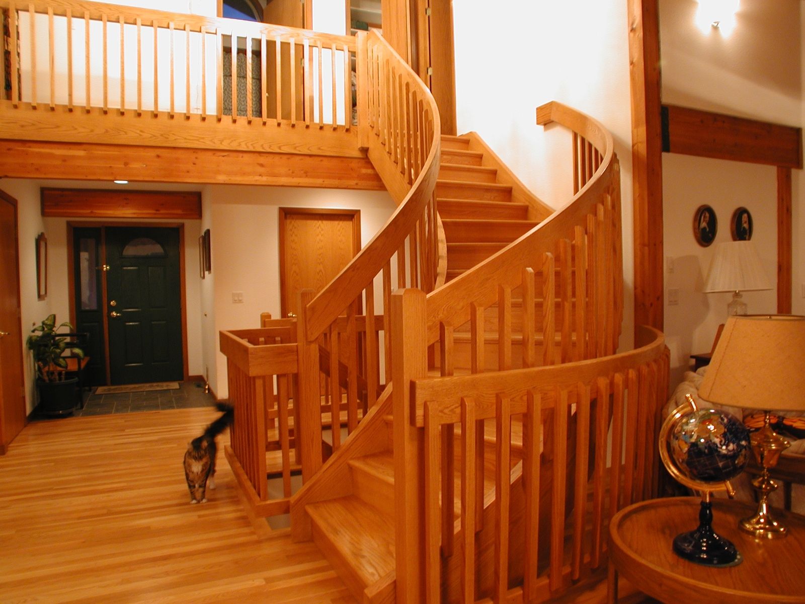 Hand Made Curved Craftsman Style Red Oak Staircase by Master Woodworks