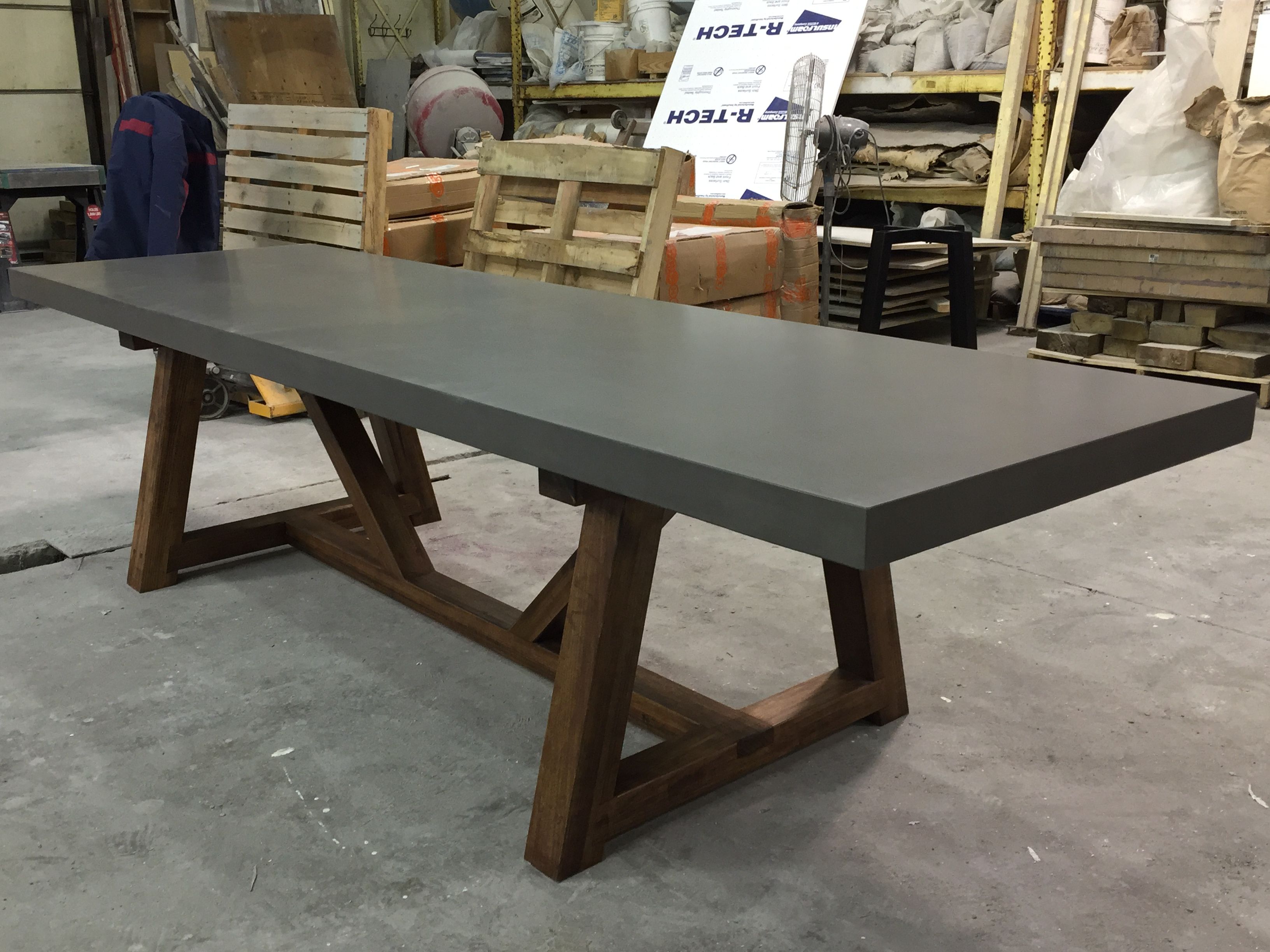 concrete pedastal dining room table