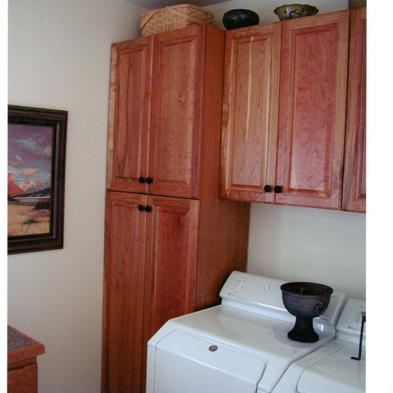 Custom Cherry Laundry Room by Parker Custom Woodworks