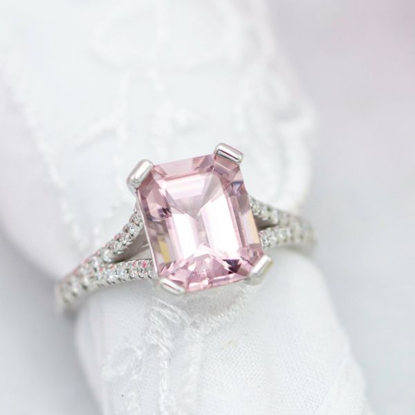 We set this emerald cut morganite with paddle-shaped prongs that perfectly fit the corners and accentuate the octagon shape of the gem.