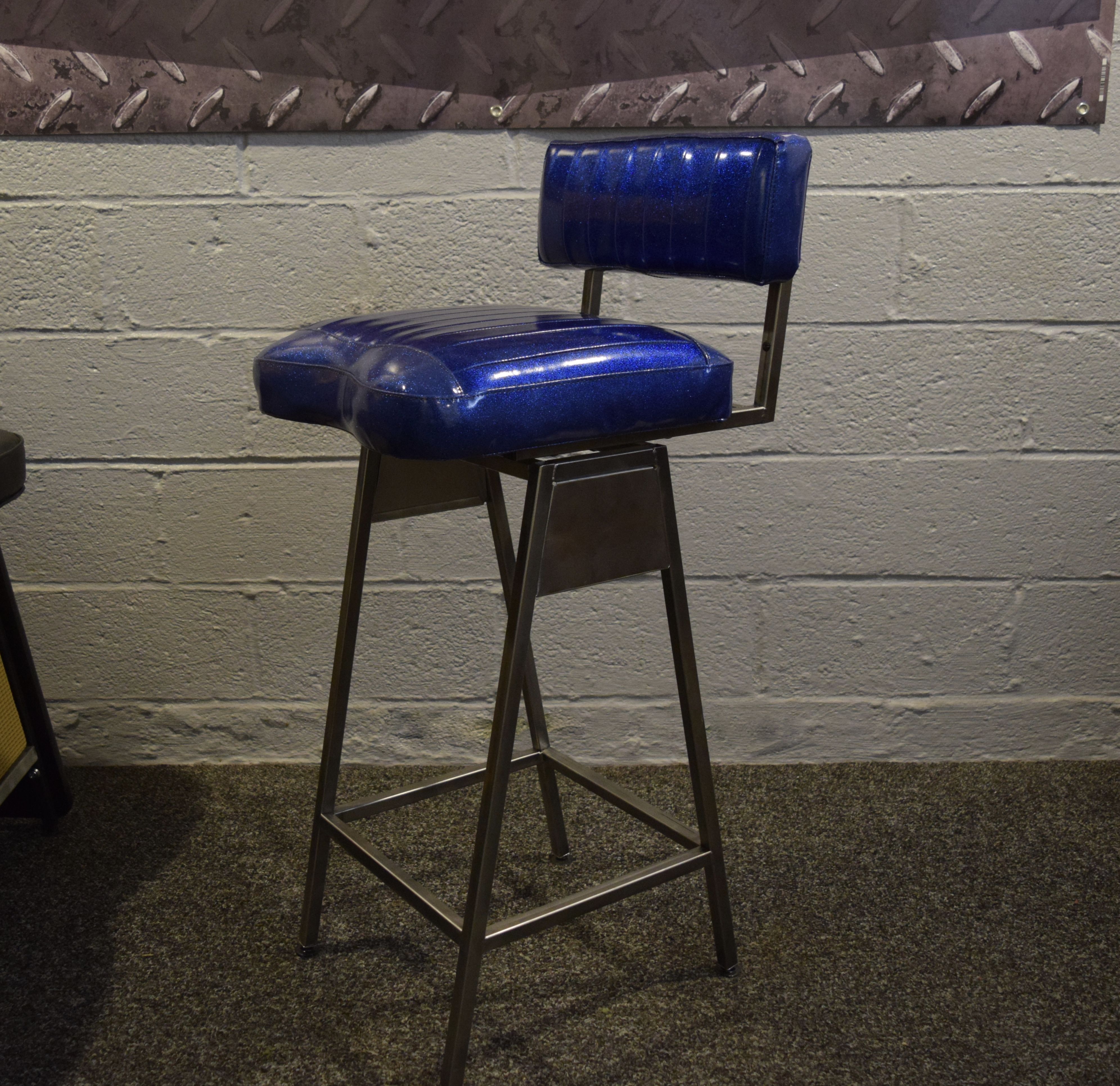 Hand Crafted Bar Stool In TuckNRoll Vinyl. by Boarwood LLC