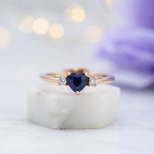 A very deep blue natural sapphire in a heart cut.