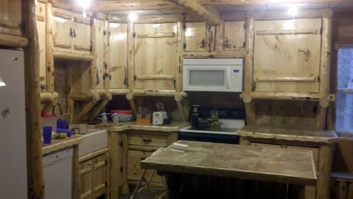 Custom Made Rustic Log Kitchen Cabinets And Bar