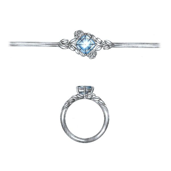 A kite set cushion cut aquamarine comes to life in this floral white gold ring.