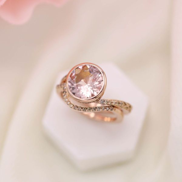 The pink morganite and cognac diamond accents are set in blushing rose gold.