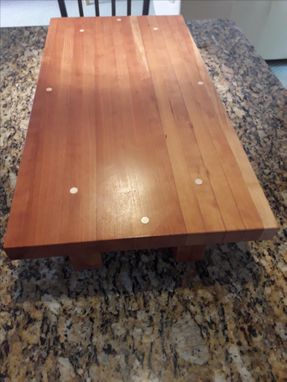 Custom Made Cherry Cutting Board With Five Inch Legs And Maple Inlay