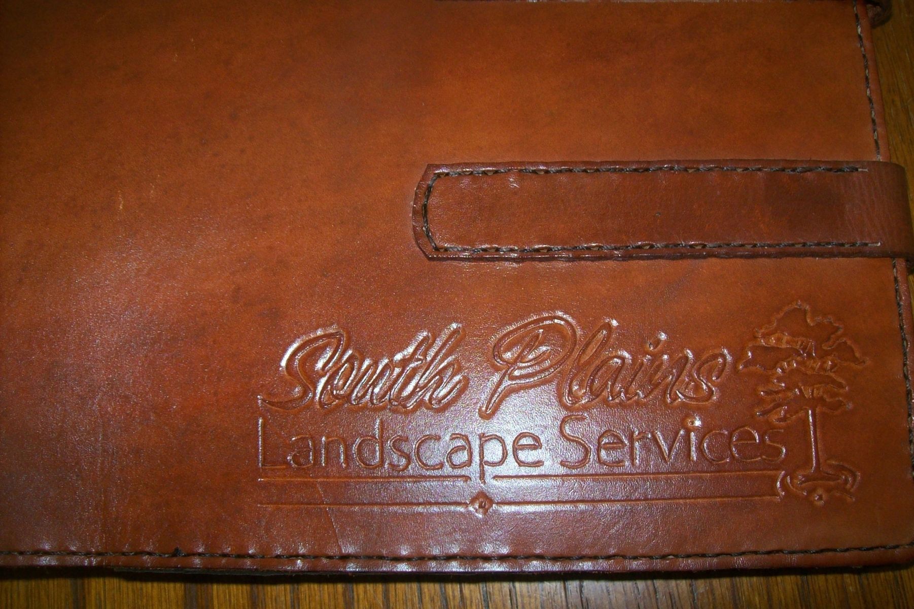 stitched leather checkbook cover