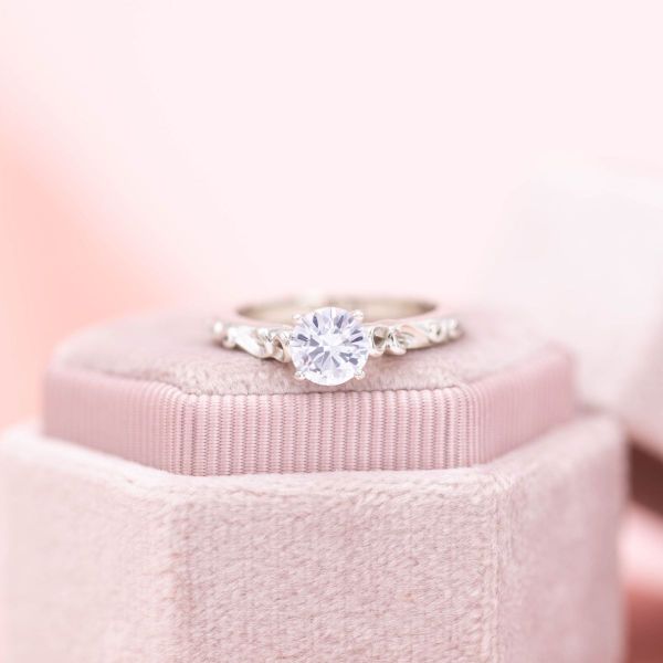 A white sapphire engagement ring.