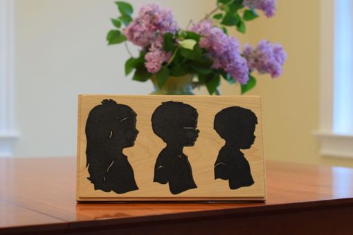 Custom Made Silhouettes Carved In Wood Filled With Epoxy