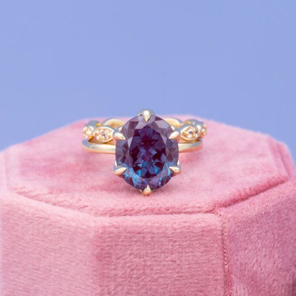 This 6.5 carat alexandrite makes a statement in this yellow gold engagement ring.