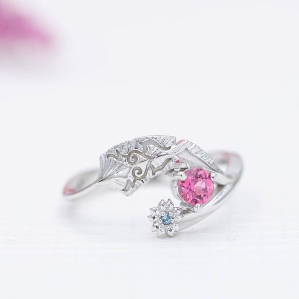 Inspired by the Manga 'Tsubasa Reservoir Chronicle,' we designed this pink tourmaline and aquamarine feather ring.