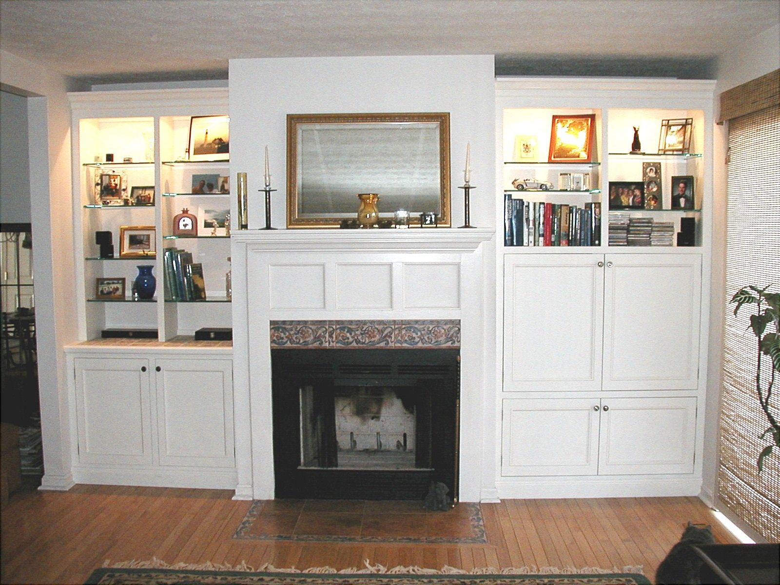 White built in cabinets around fireplace