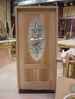 Custom Made White Oak Front Entrance Door With Oval Leaded Glass
