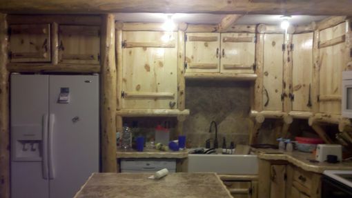 Custom Made Rustic Log Kitchen Cabinets And Bar