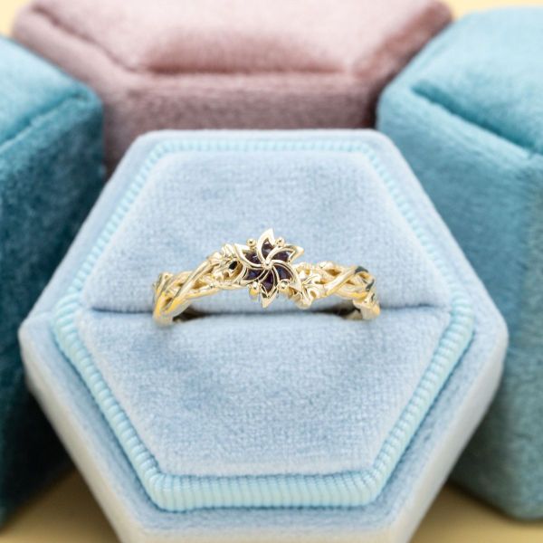 A yellow gold band and a branches-and-leaves motif give this Nenya inspired ring a feel of fall.