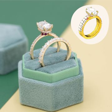 Oval engagement ring with ruby hidden halo