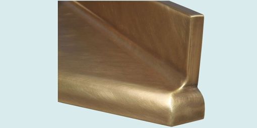 Custom Made Bronze Countertop With Integral Backsplash