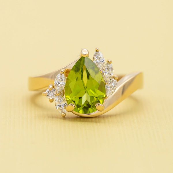 This pear shaped peridot has a green apple hue; all about fruit here!
