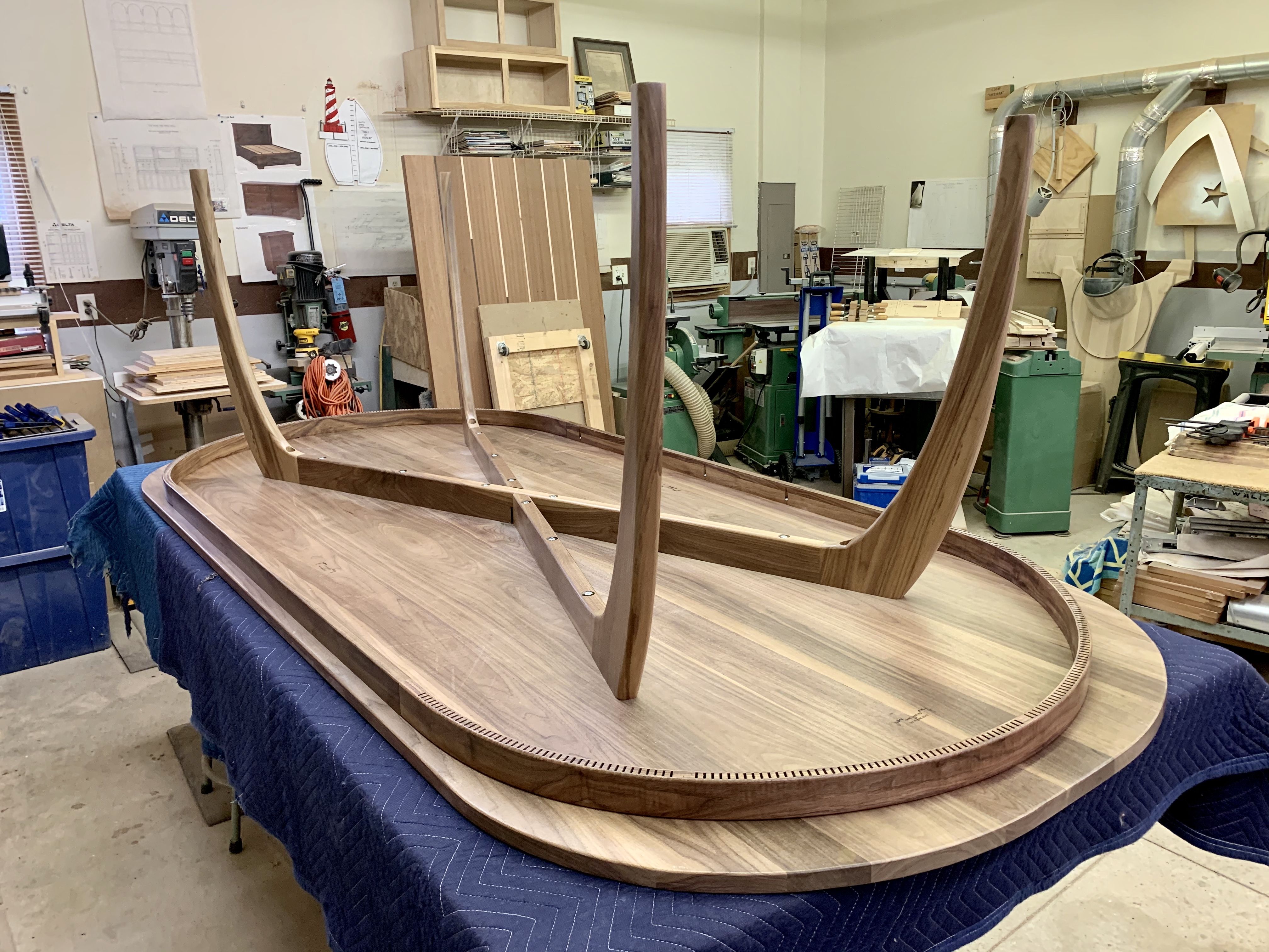 Hand Crafted Solid Walnut Dining Table With Curved Legs by The Plane Edge, LLC