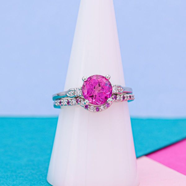 A brilliant pink sapphire in a white gold setting.