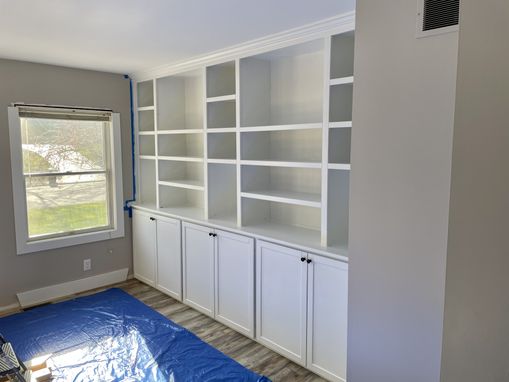 Custom Made Built-In Wall Shelving With Base Cabinet With Doors