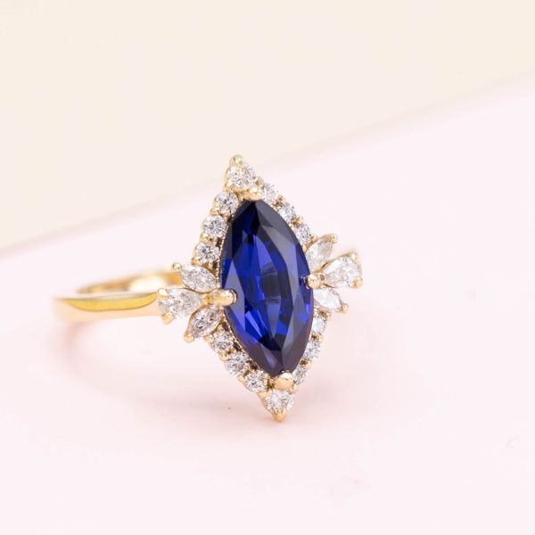 A lab-created sapphire, like this blue marquise cut, is often treated with heat to improve its color.