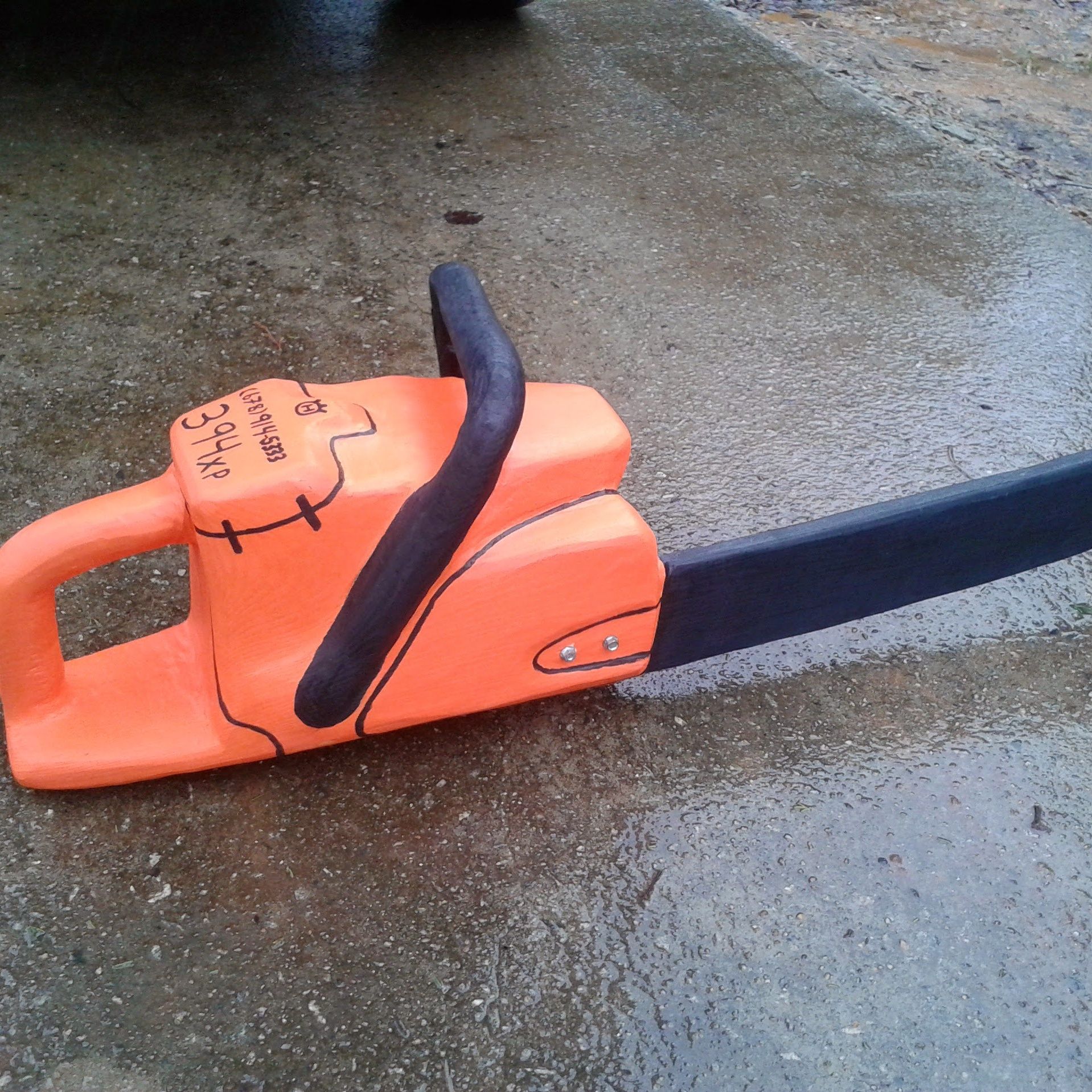 Buy Hand Made Chainsaw Carving Of A Chainsaw, made to order from Carter