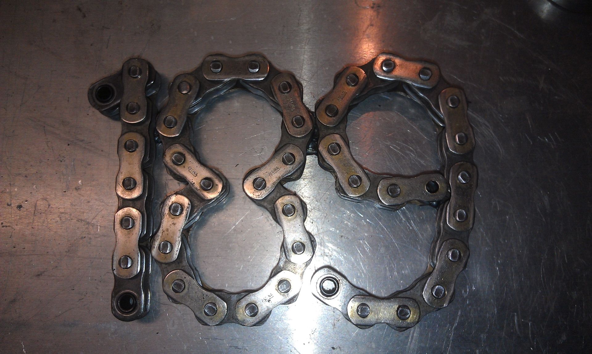Hand Made Chain Numbers by Moto Metal Fab