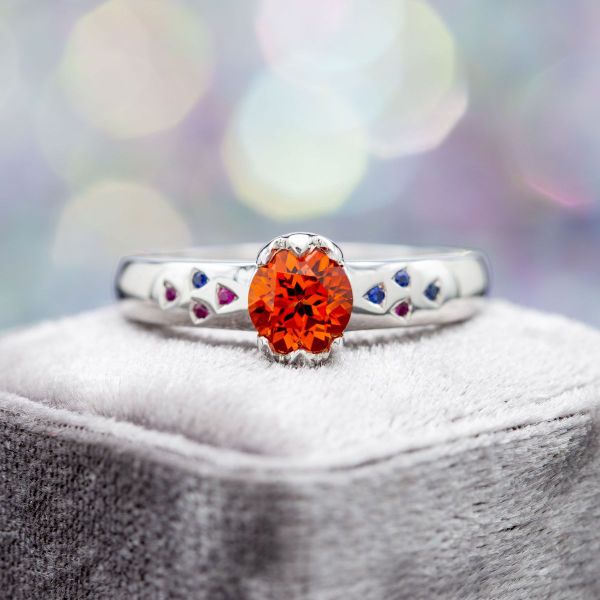Rubies and sapphires add lots of color to this Pokemon inspired ring.