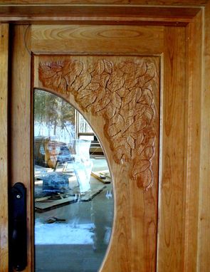 Custom Made Birch Carving On Cherry Door
