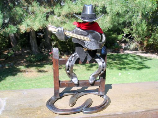 Custom Made Horseshoe Cowboy Sculpture.