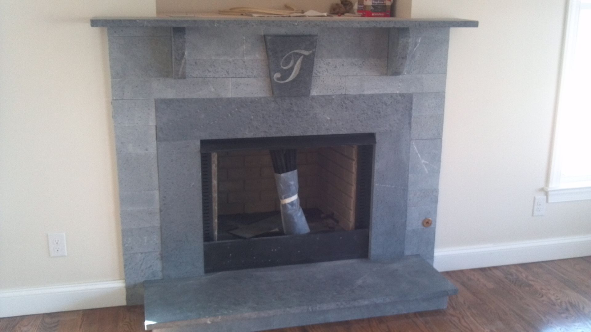 Hand Crafted Soapstone Fireplace Surround by Mark Mcquarry