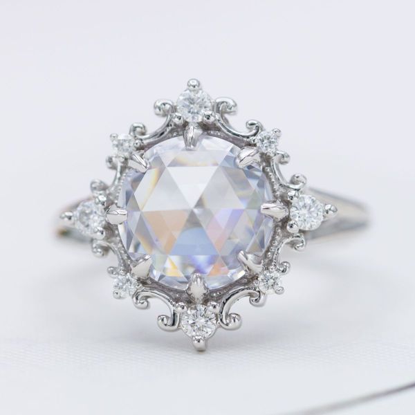 The rose cut diamond is the perfect center stone for an antique style engagement ring.