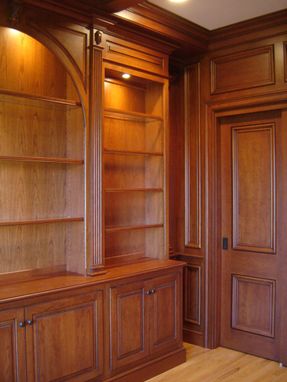 Custom Made Cherry Paneled Library With Bookcases
