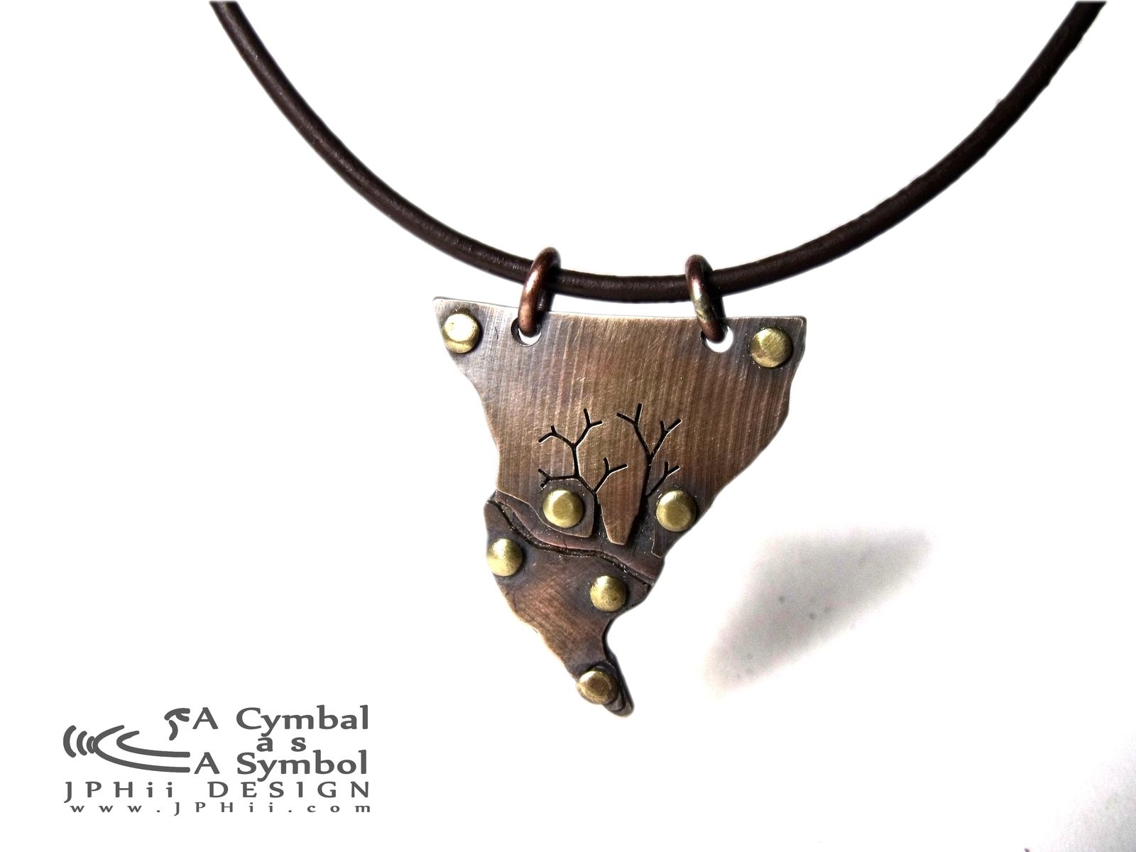 Buy a Hand Crafted Recycled Drum Cymbal Necklace, made to order from