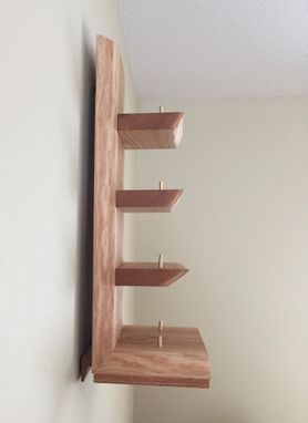 Custom Made Live Edge Wall Hanging Four Bottle Rack With Glass Holder.