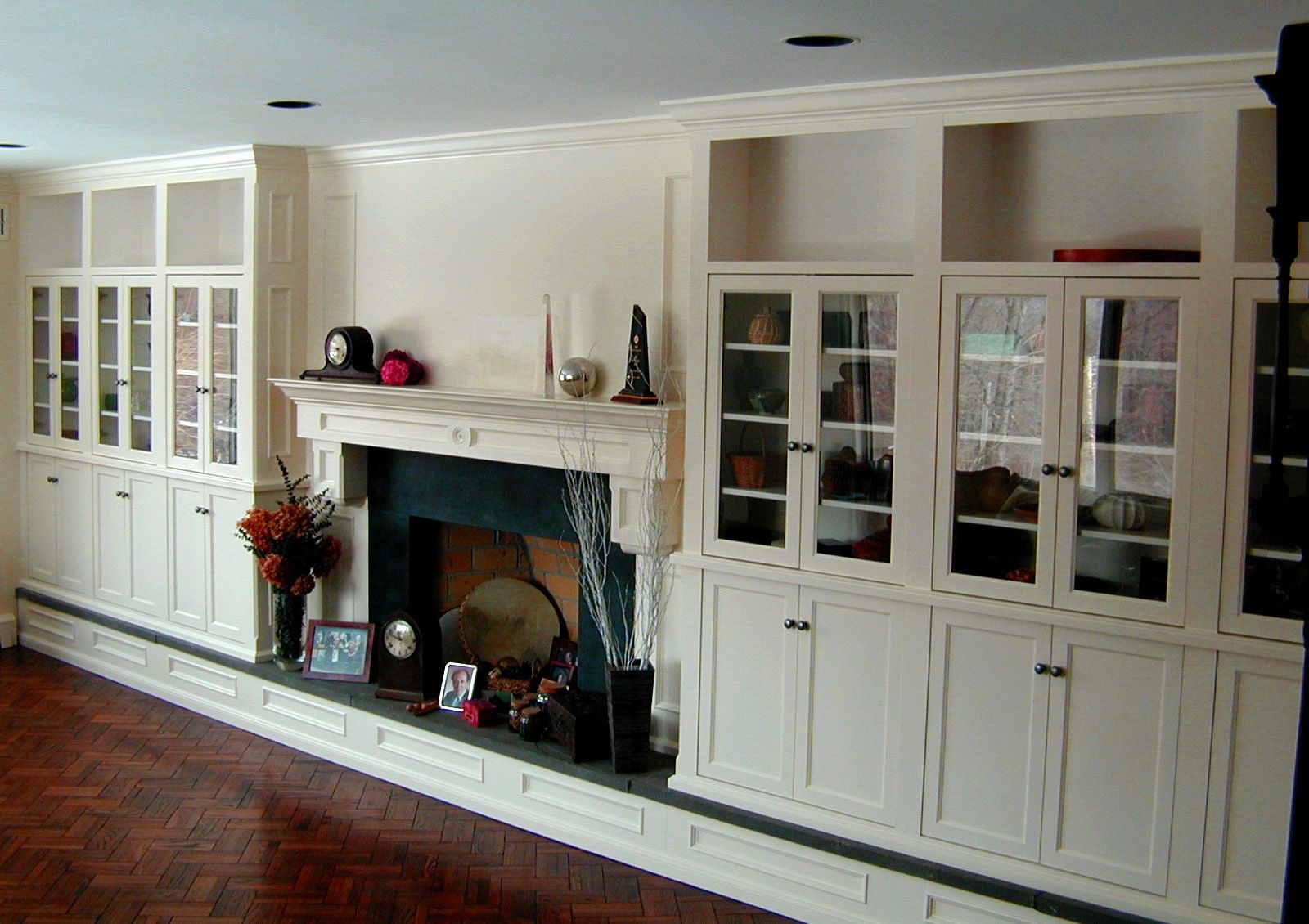 Custom Display Cabinetry With Fireplace Surround by Hudson