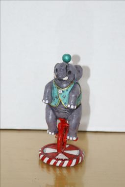 Custom Made Hand Sculpted Polymer Figurine Of Circus Elephant In Teal On Unicycle