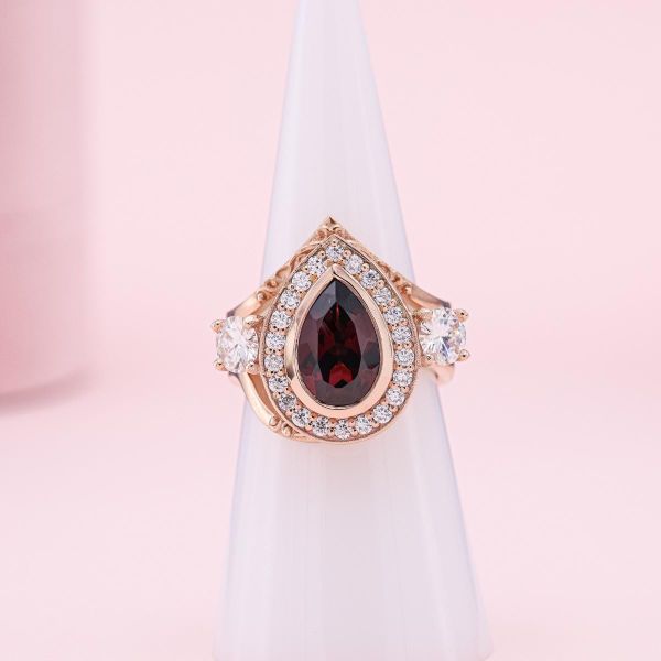 Garnet offers the deep red colors that natural alexandrites are known for in dim lighting.