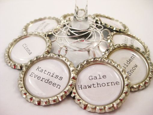 Custom Made Upcycled Bottle Caps Hunger Games Wine Charms In Set Of 8