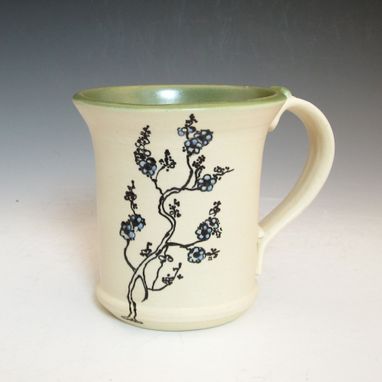 Custom Made Pottery Mug With Small Flowers In Black And Blue