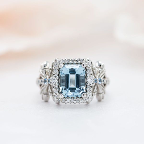 This 2.2ct emerald cut aquamarine sits in a white gold dragonfly setting.