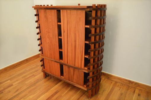 Custom Made Stereo Cabinet Featuring Bent African Ribbon Sapele