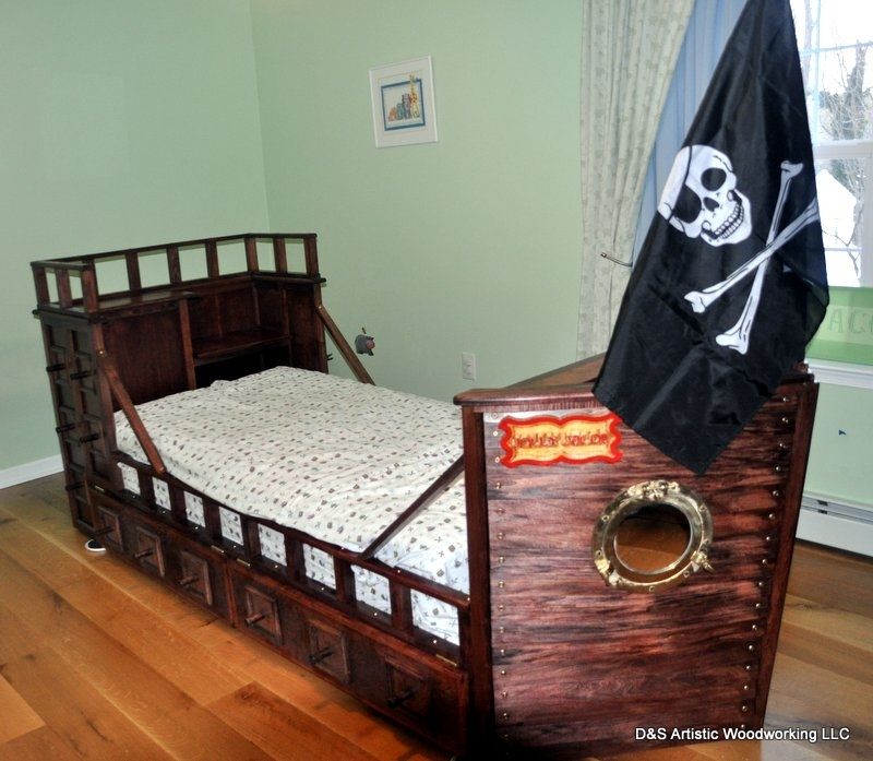 A Whimsical Childrens Bedroom Designed As a Pirate Ship with