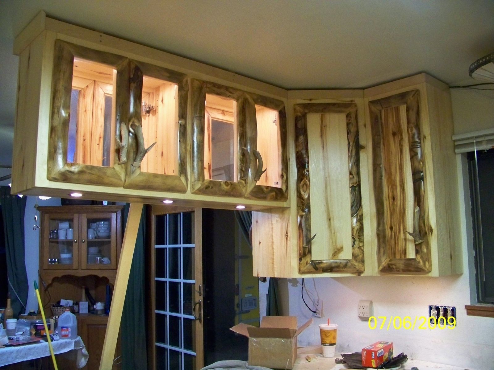 Hand Made Rustic Aspen Log Kitchen Cabinets And Built In Wall